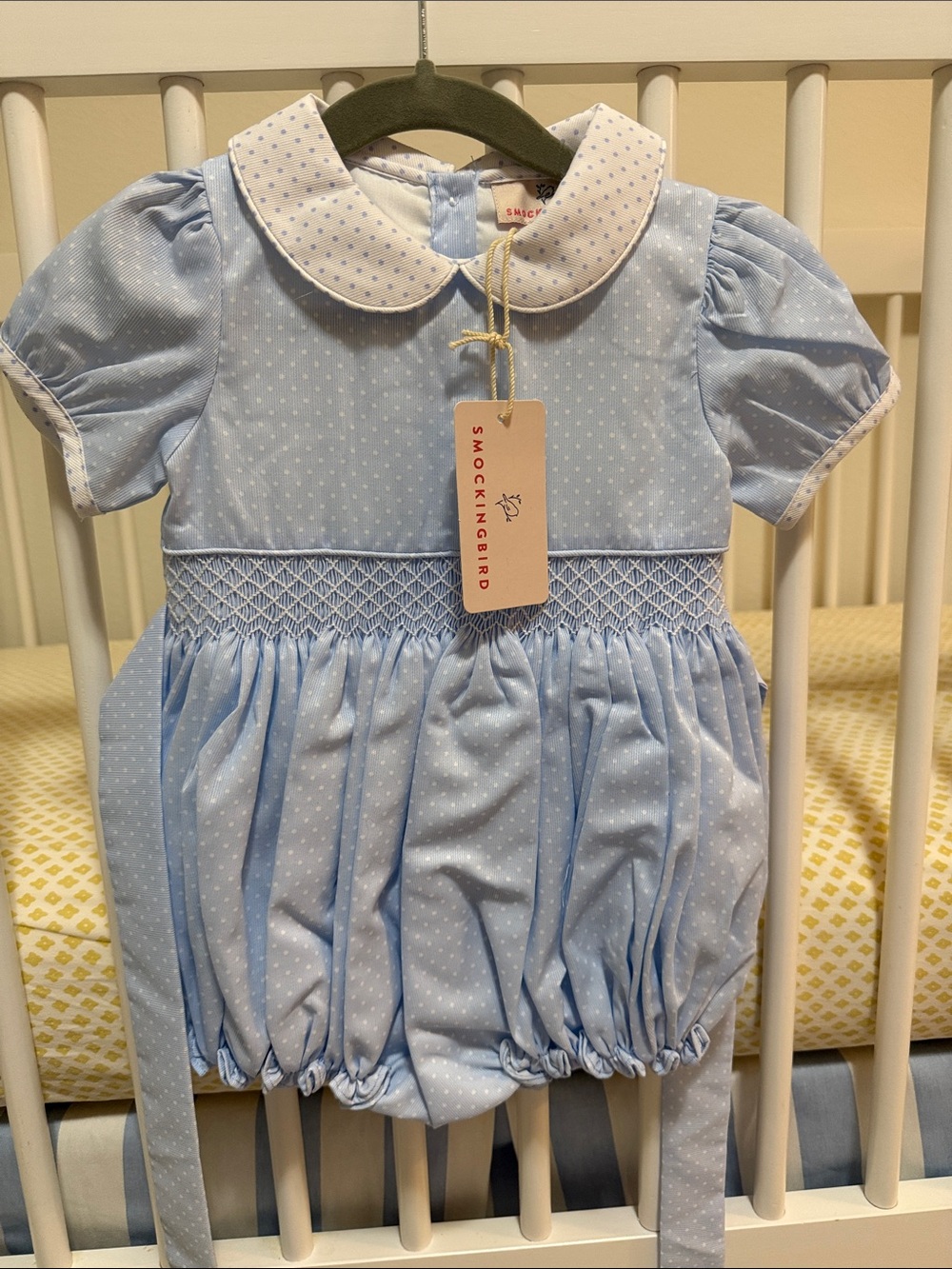 Blue polka dot bubble with smocking midsection and puff sleeves